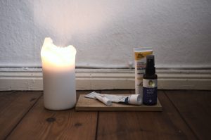 Burning candle and cosmetic products