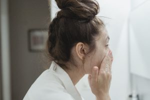 Side View of Woman Washing Her Face